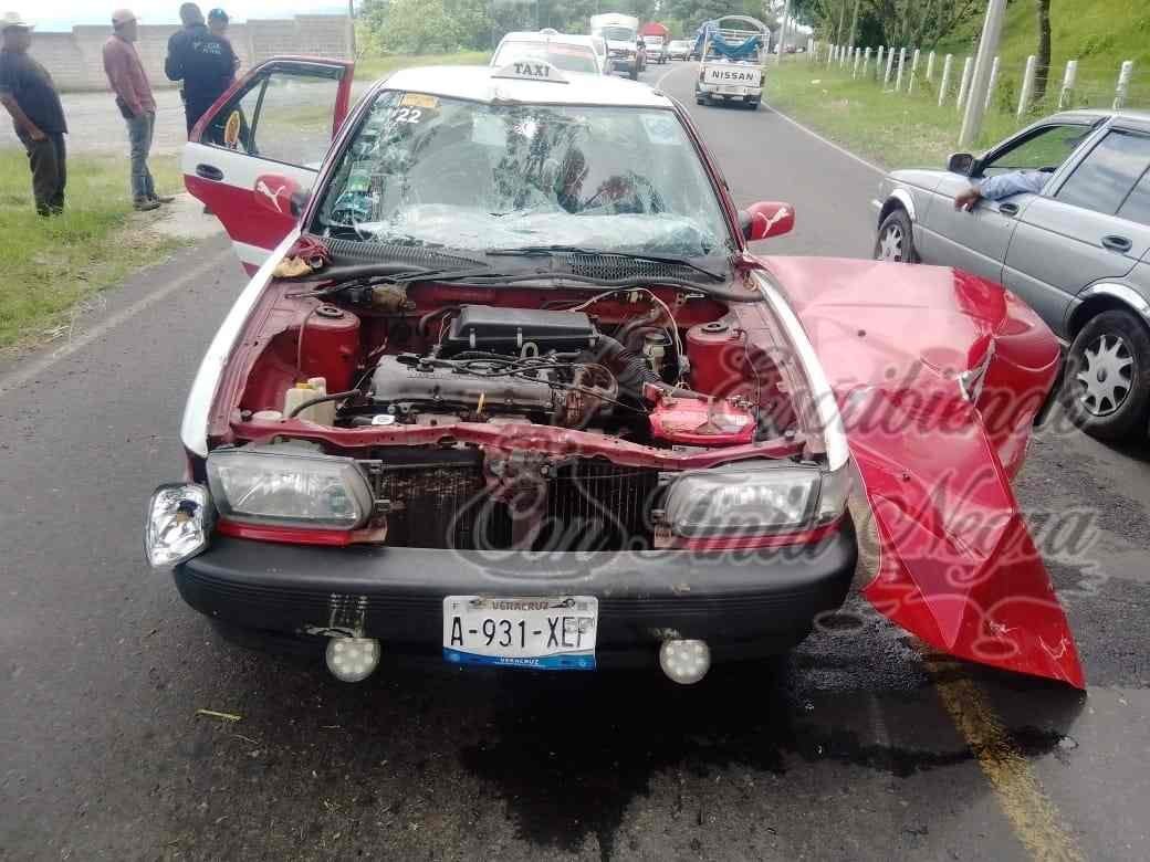 SE ESTRELLA TAXI CONTRA TRACTOR