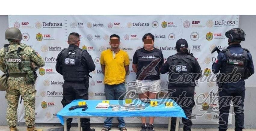 CAEN DOS CON ARMA Y DROGA